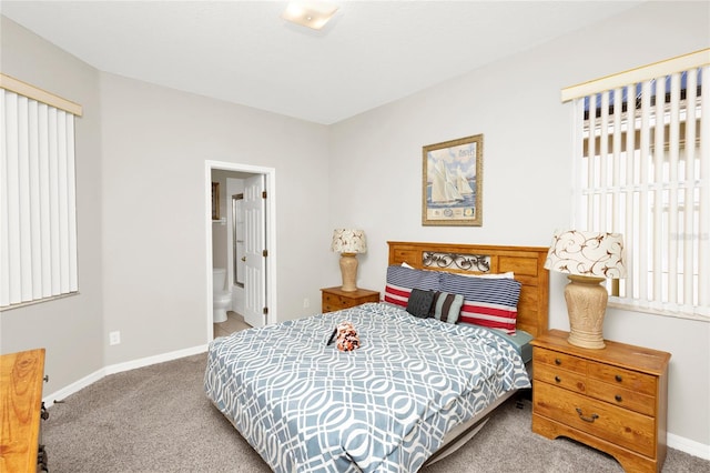 bedroom with carpet and ensuite bathroom