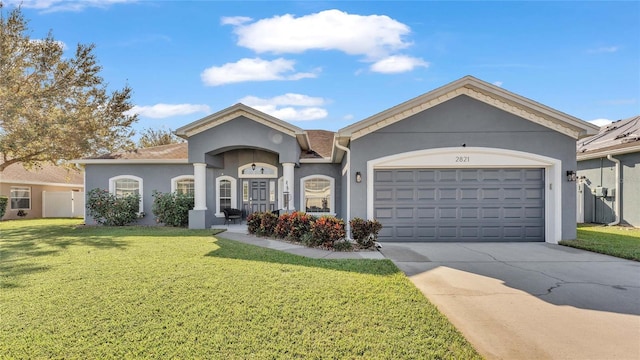 single story home featuring a front yard and a garage