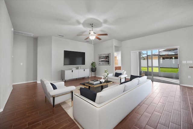 living room with ceiling fan