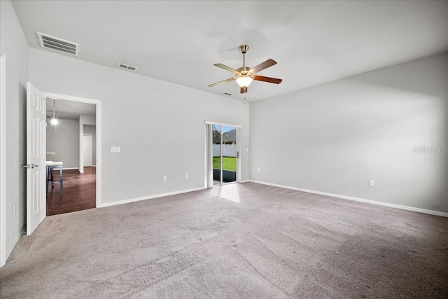 carpeted spare room featuring ceiling fan