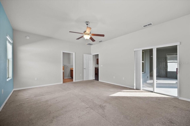 unfurnished room featuring light colored carpet and ceiling fan