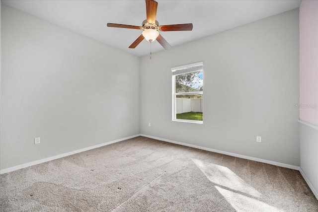 unfurnished room with carpet floors and ceiling fan