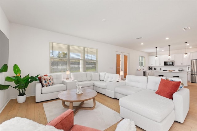 living room with light wood-type flooring