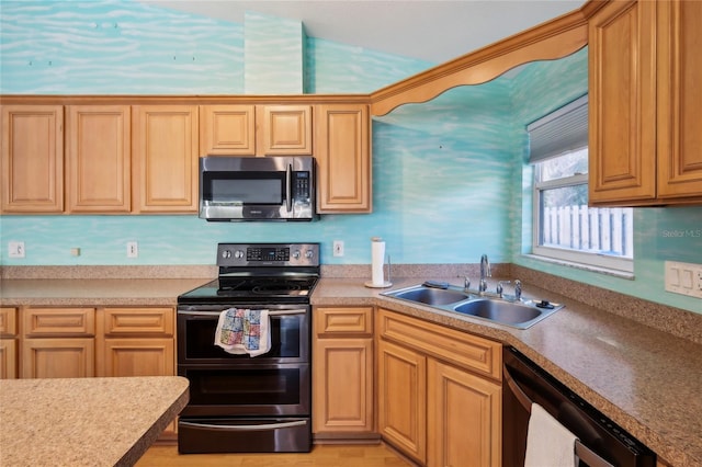 kitchen with sink and stainless steel appliances