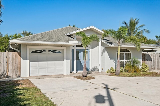 single story home with a garage