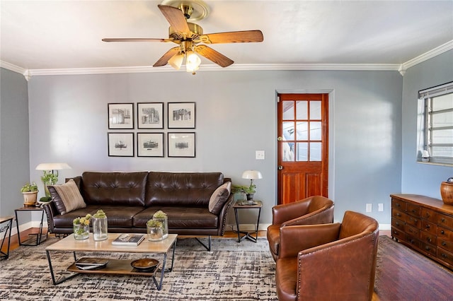 living room with hardwood / wood-style flooring, ceiling fan, and ornamental molding