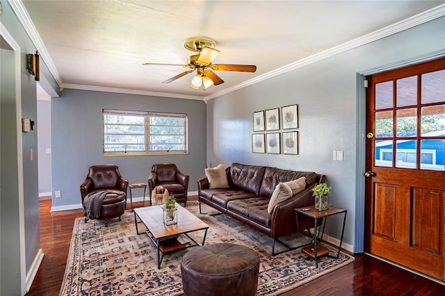 living room with ceiling fan, crown molding, and dark wood-type flooring