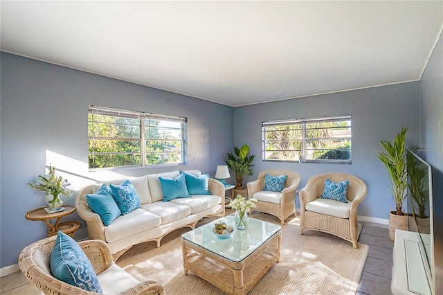 tiled living room with a wealth of natural light