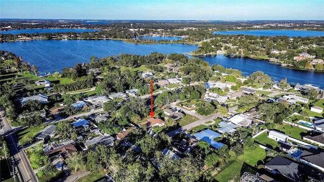 drone / aerial view with a water view