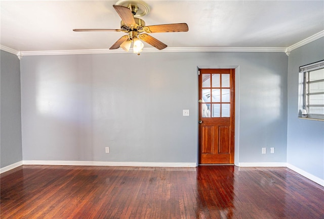 spare room with dark hardwood / wood-style floors, ceiling fan, and ornamental molding