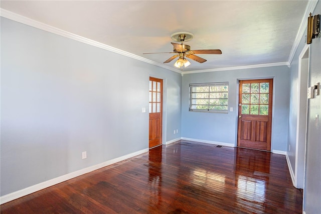 unfurnished room featuring dark hardwood / wood-style floors, ceiling fan, and crown molding