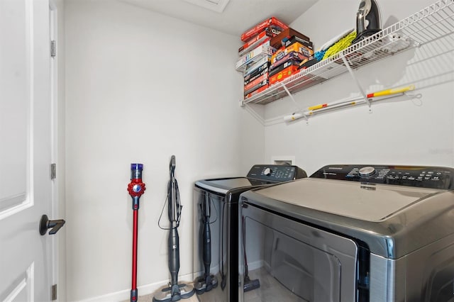 laundry room featuring washing machine and dryer