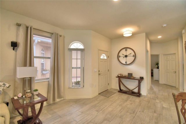 1644 Linz Ct, Winter Haven, FL 33884 - entrance foyer featuring light wood finished floors, baseboards, and recessed lighting