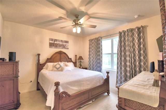 1644 Linz Ct, Winter Haven, FL 33884 - bedroom featuring light colored carpet, a ceiling fan, baseboards, and a textured ceiling
