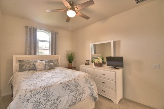 1644 Linz Ct, Winter Haven, FL 33884 - bedroom featuring light colored carpet, baseboards, and ceiling fan