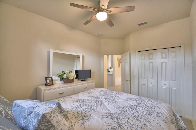 bedroom featuring ceiling fan and a closet