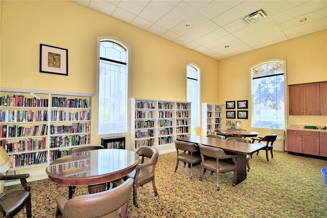 1644 Linz Ct, Winter Haven, FL 33884 - dining area with carpet flooring and a drop ceiling