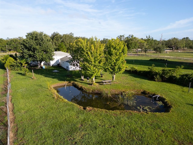 aerial view featuring a rural view and a water view