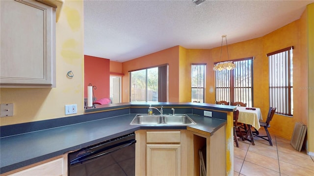 kitchen featuring a textured ceiling, an inviting chandelier, black dishwasher, and sink