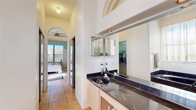 bathroom with vanity and tile patterned flooring