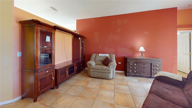 living area with light tile patterned flooring