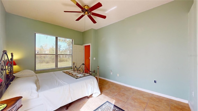 bedroom featuring ceiling fan and light tile patterned floors