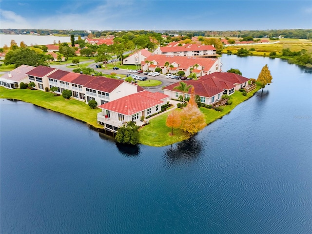 drone / aerial view with a water view