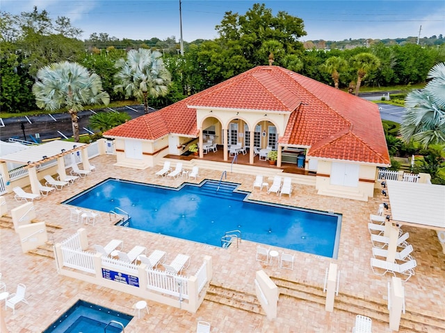 view of pool featuring a patio