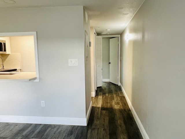 hall featuring dark hardwood / wood-style floors