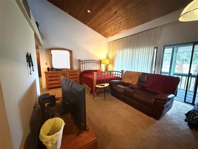 2115 Corner Lake Dr Unit E, Haines City, FL 33844 - carpeted bedroom with wooden ceiling, high vaulted ceiling, and access to exterior