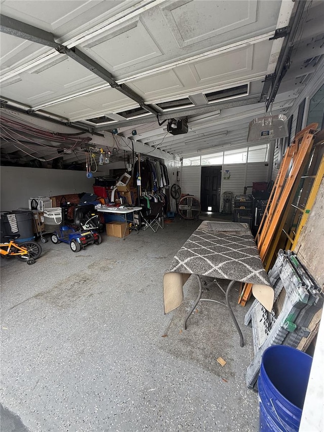 garage featuring a garage door opener