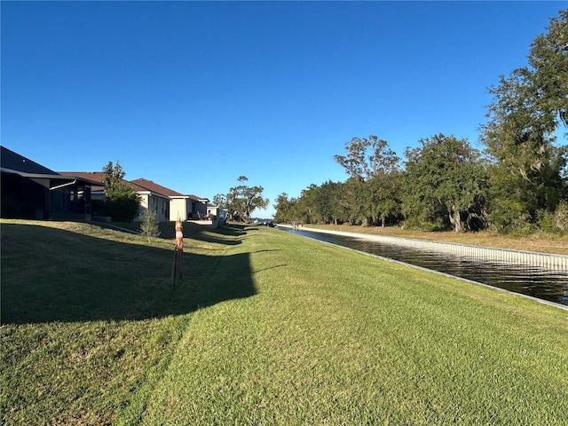 view of yard featuring a water view