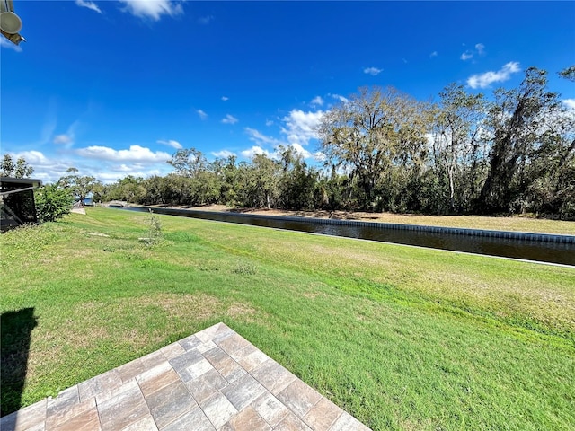 view of yard with a water view