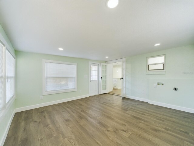 empty room featuring hardwood / wood-style floors