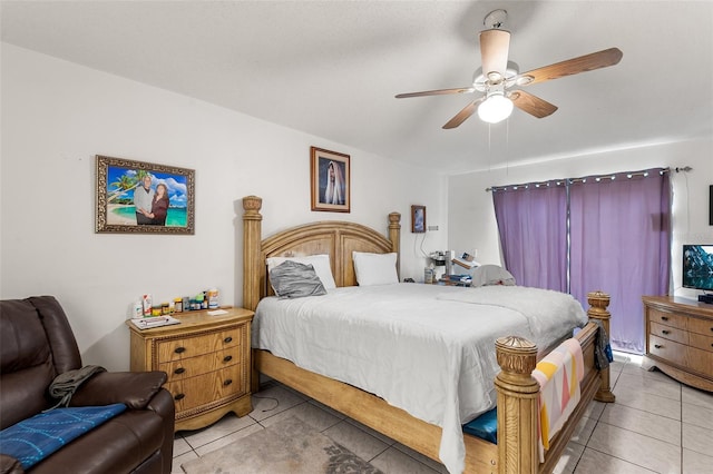 bedroom featuring ceiling fan and light tile patterned floors