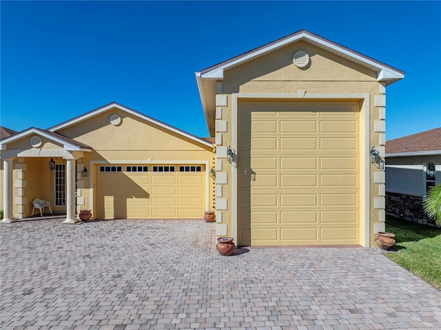 single story home with a garage