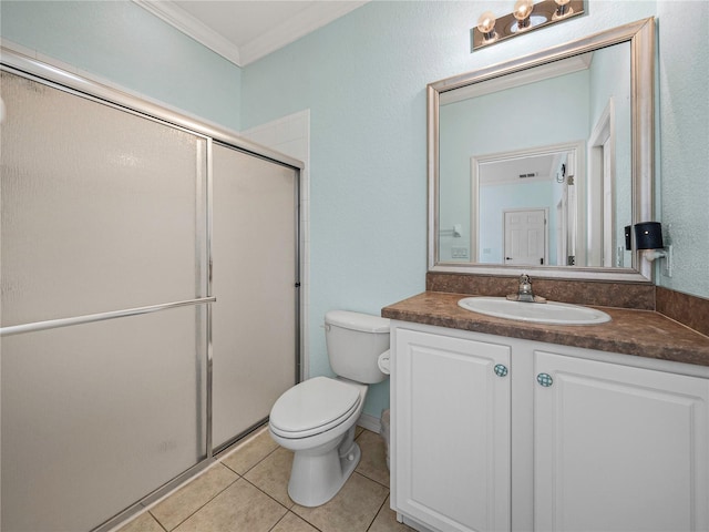 bathroom featuring tile patterned flooring, an enclosed shower, toilet, vanity, and ornamental molding