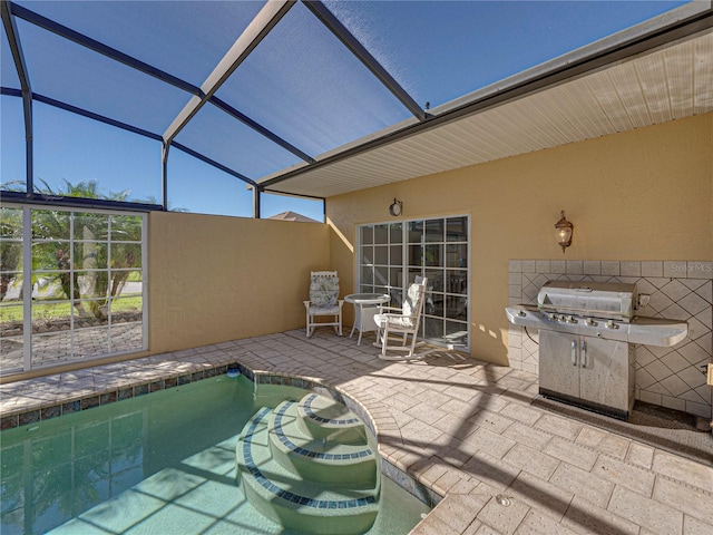 view of swimming pool featuring a lanai, a patio area, and a grill