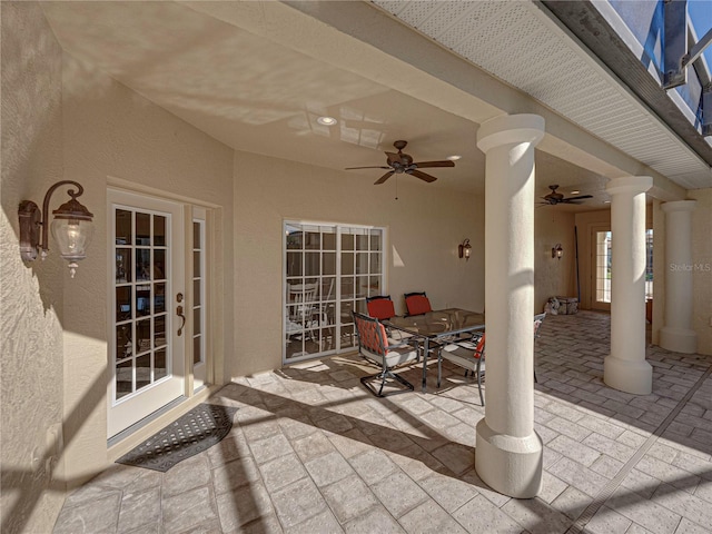 view of patio featuring ceiling fan