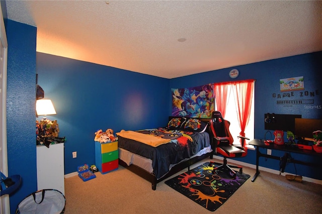 carpeted bedroom featuring a textured ceiling