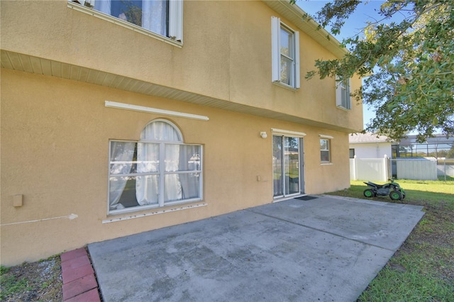 rear view of property with a patio area