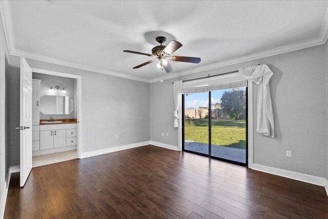 unfurnished bedroom featuring access to outside, dark hardwood / wood-style floors, ensuite bath, and ceiling fan