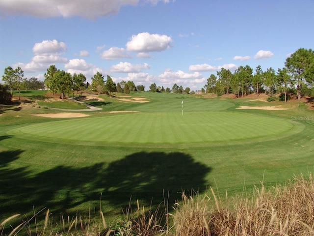 1591 Forest Hills Ln, Haines City, FL 33844 - view of community with view of golf course and a putting area