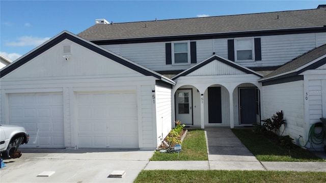 front of property featuring a garage