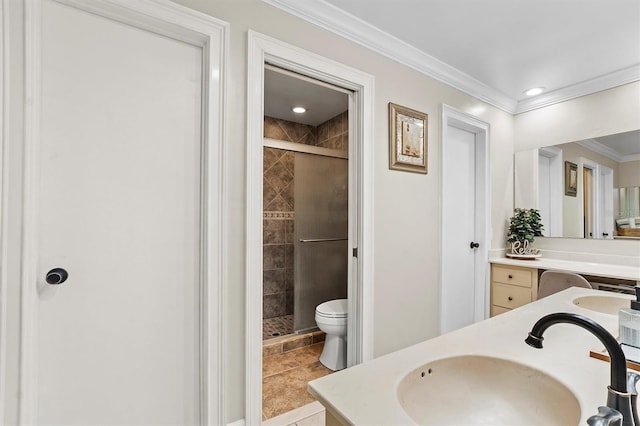 full bathroom with toilet, crown molding, a shower stall, and vanity