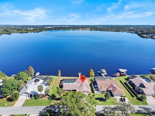 birds eye view of property featuring a water view