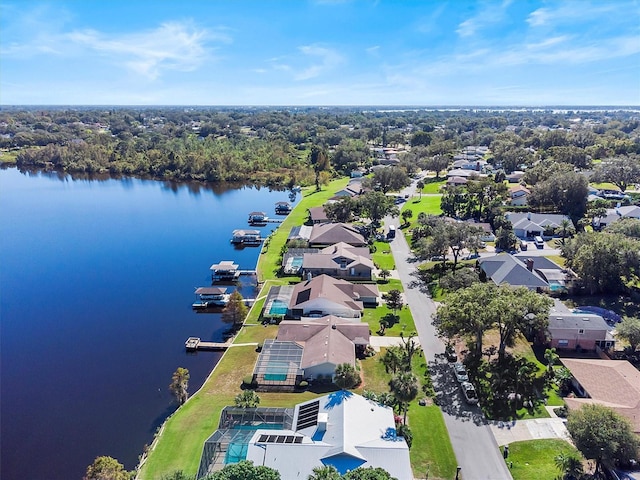 aerial view featuring a residential view and a water view