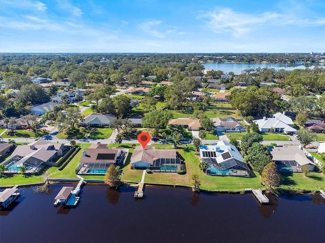 bird's eye view with a residential view and a water view