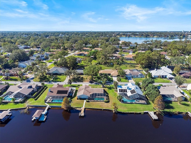 bird's eye view featuring a residential view and a water view