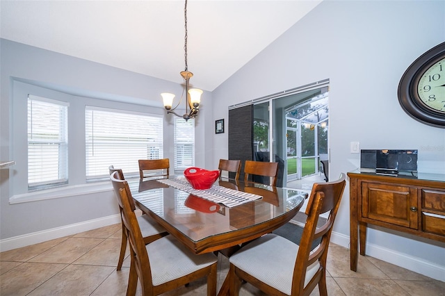 dining area featuring light tile patterned flooring, lofted ceiling, and an inviting chandelier